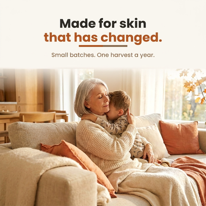 Grandmother hugging a child on a sofa